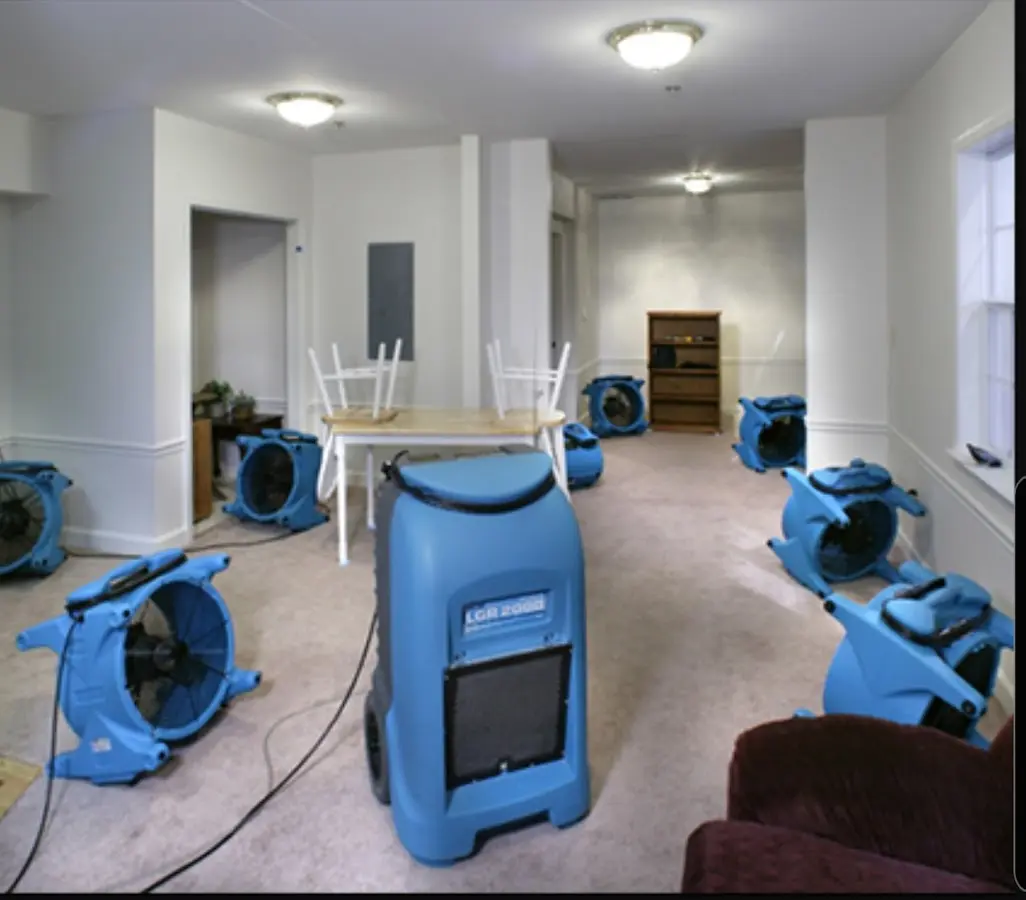 Air movers and dehumidifier setup for Water Damage Restoration in Leicester